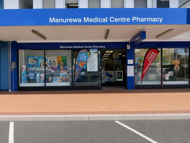 The Manurewa Medical Centre Pharmacy building on Great South Road, with parking directly outside